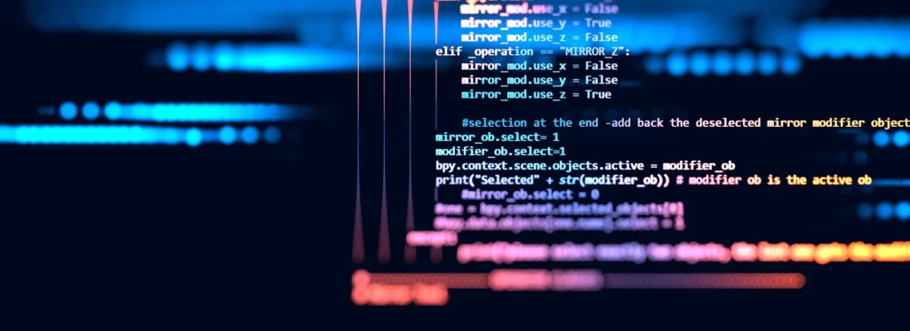 Bunte Programmiercodezeilen auf dunklem Bildschirm